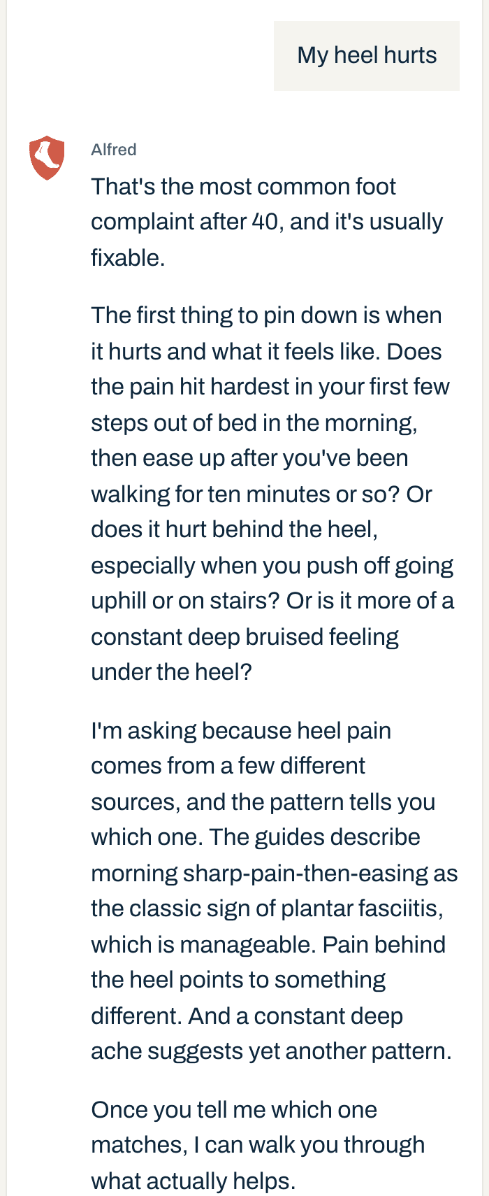 “My heel hurts,” and Alfred’s reply: it names the most common cause after 40, then asks whether the pain hits hardest in the first steps out of bed, behind the heel, or as a constant deep bruise, and says it is asking because the pattern tells you which one.